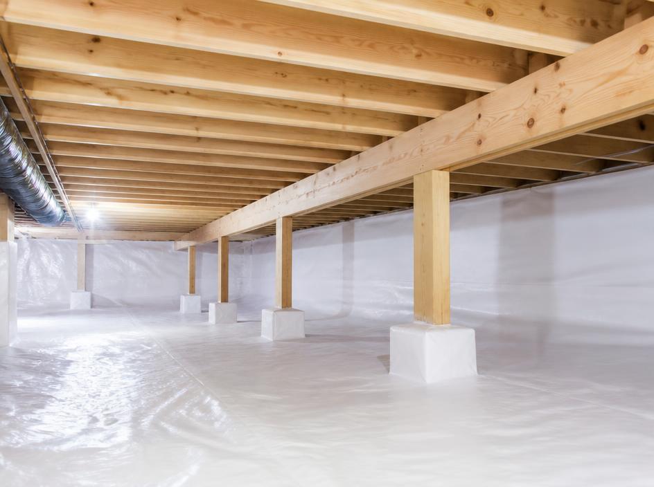 Clean, treated floor joists and framing wood after remediation